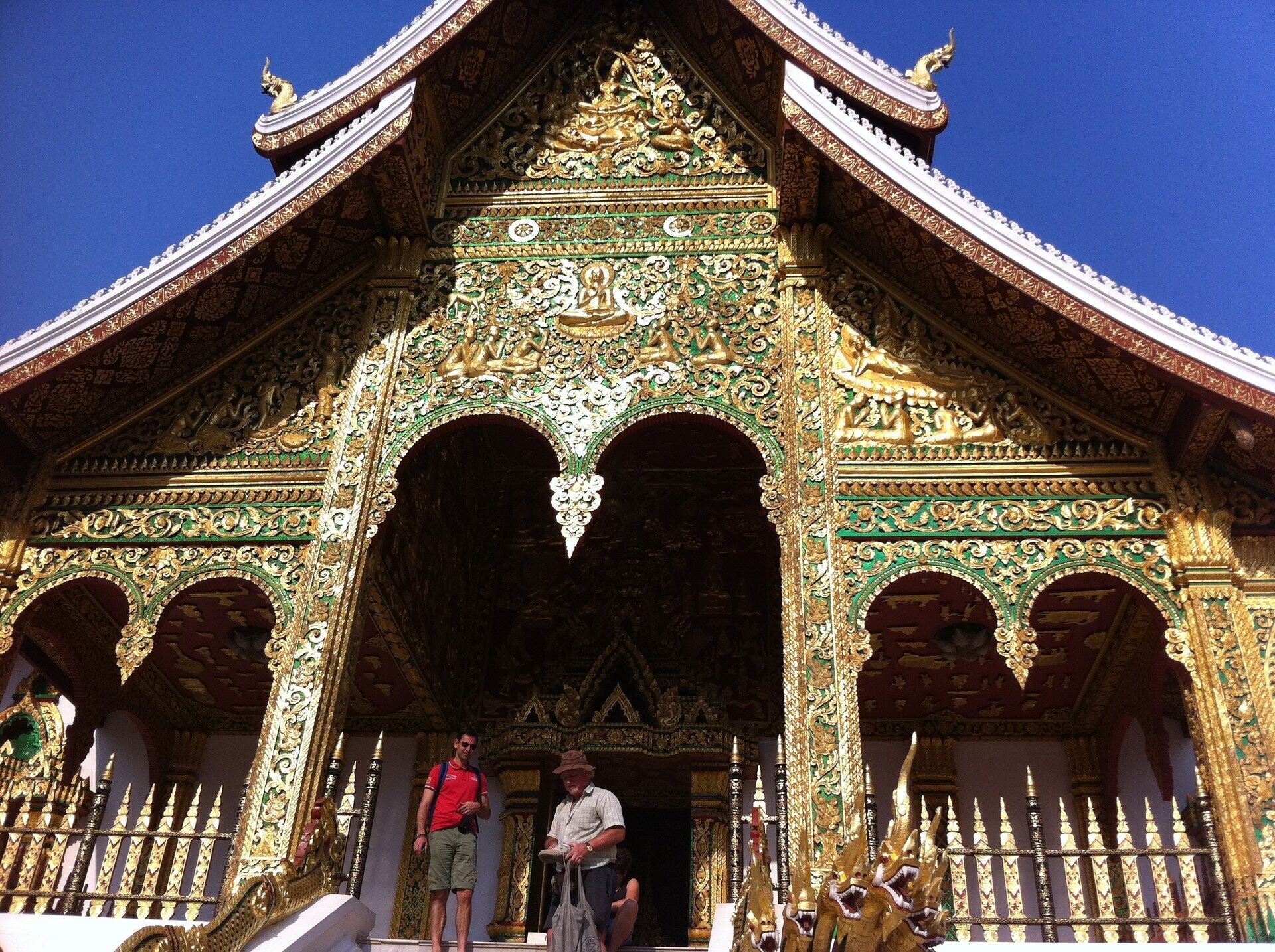 Wat Xieng Thong temple in Luang Prabang, Laos - gold and green Lao Buddhist architecture