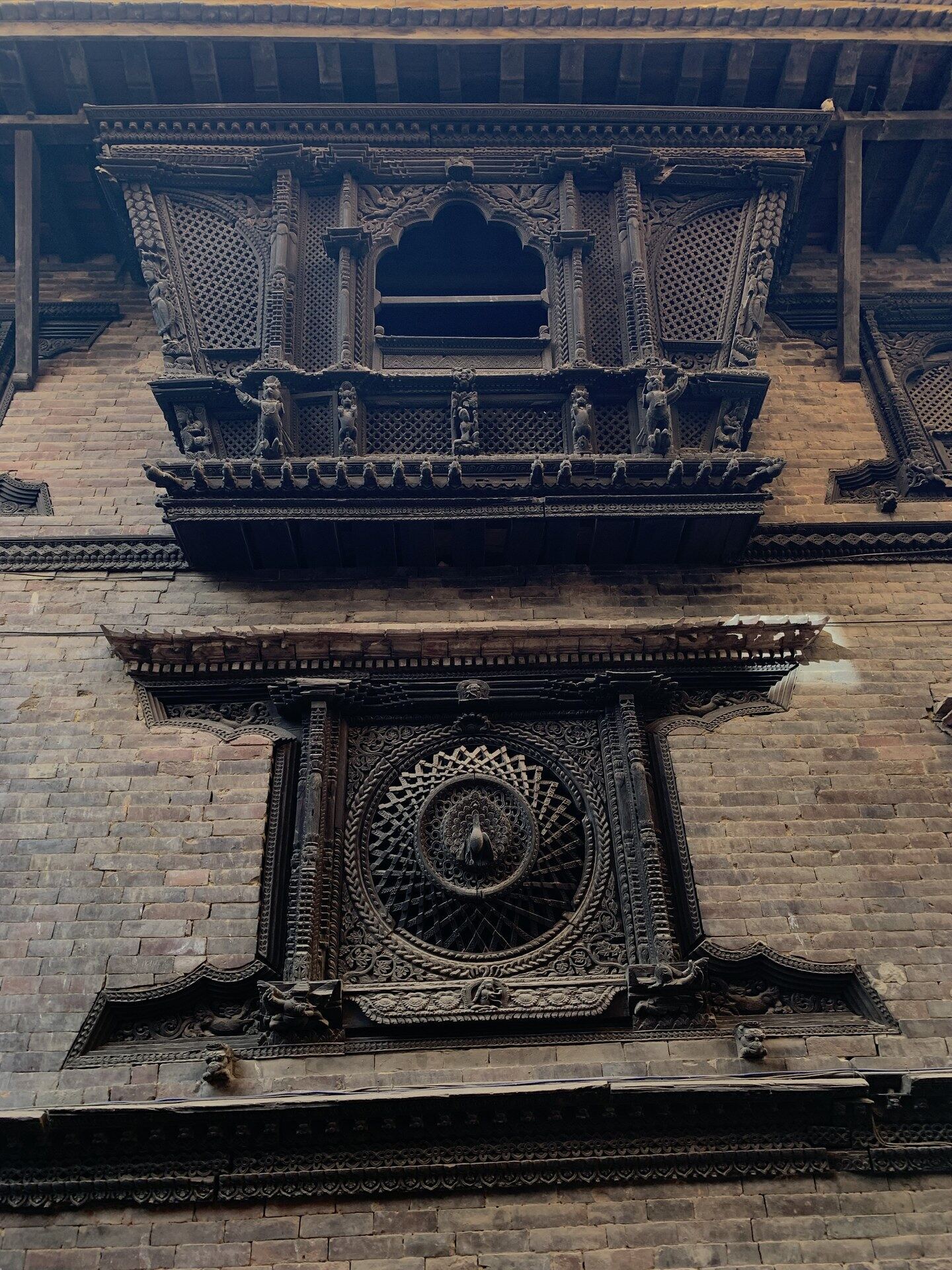 Newari craft � a carved peacock window