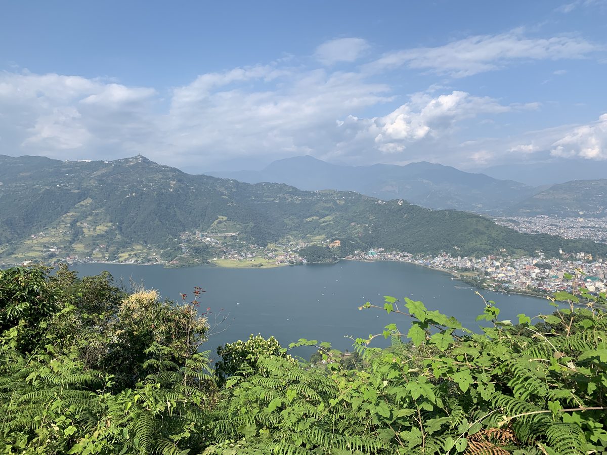 Aerial view of Pokhara valley and city spreading across the hills of Nepal
