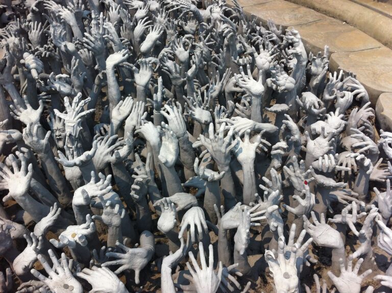 Wat Rong Khun White Temple field of hands, Chiang Rai